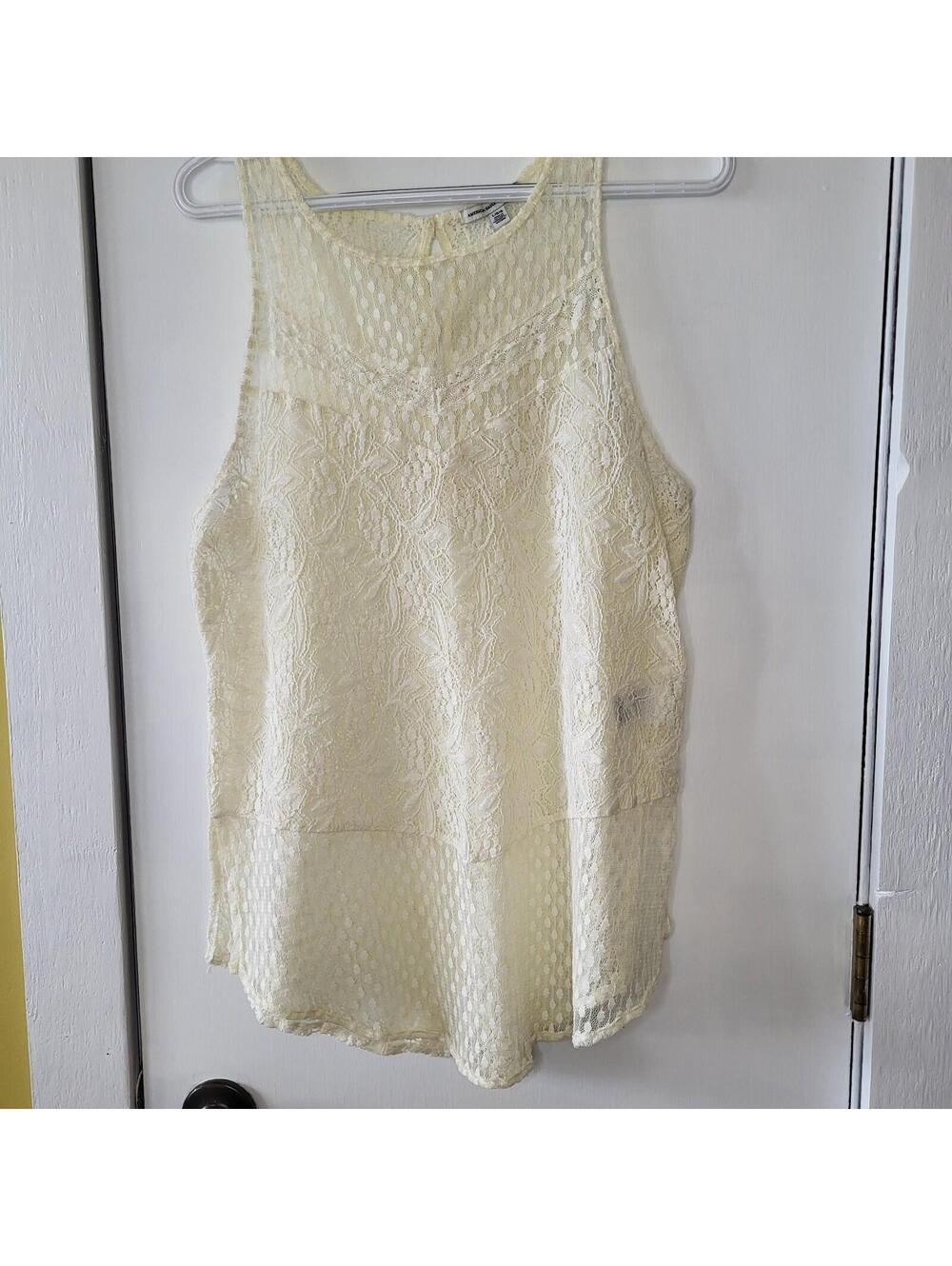 American Eagle creamy white lace sleeveless blouse with a high-low hem size LG